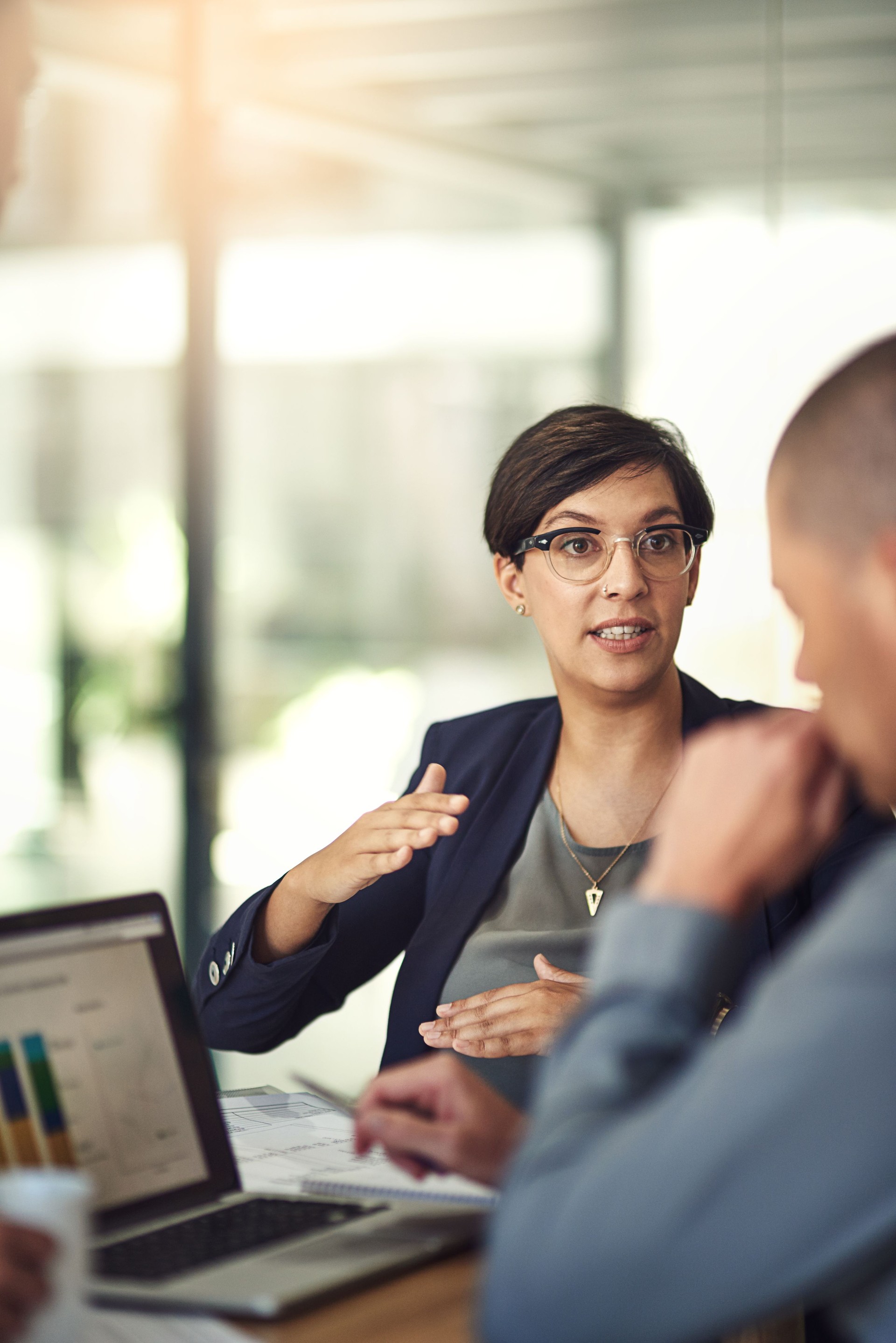 Meeting, graphs and business people on laptop screen for data analysis, financial revenue report or b2b advice. Increase, accounting stats or finance sales of accountant woman and clients on computer